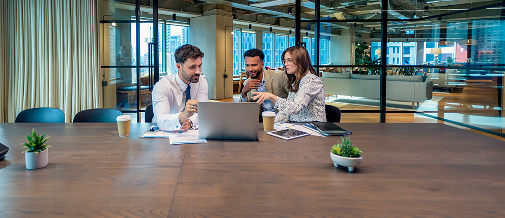 Man and woman couple discussing with financial advisor over laptop
