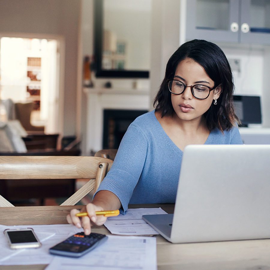 Woman Calculating Finances