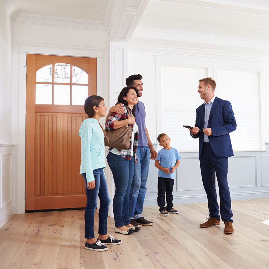 Realtor Showing Family a Potential Home