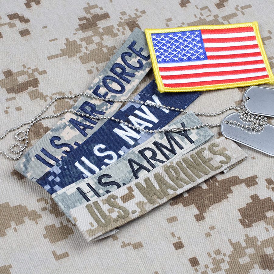 Labels of Different Military Branches With American Flag Patch and Dog Tags