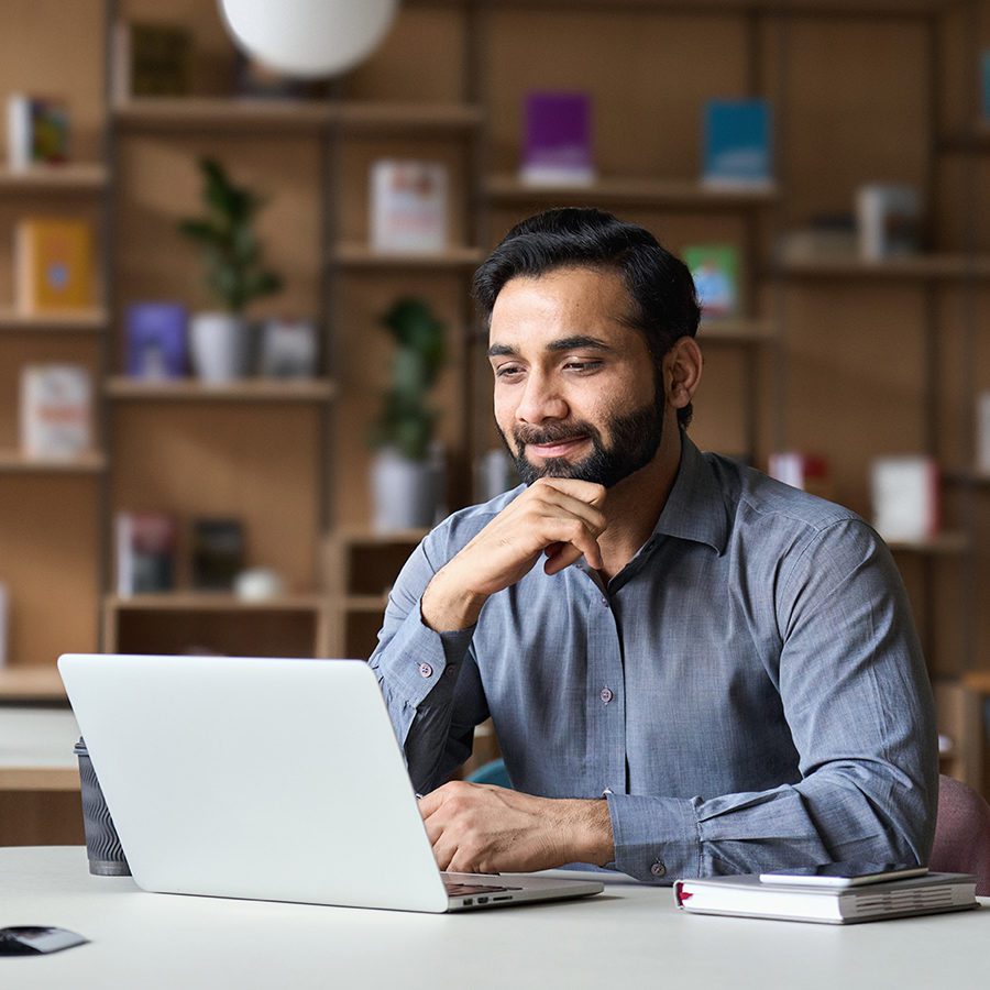 Man Learning Something on His Laptop