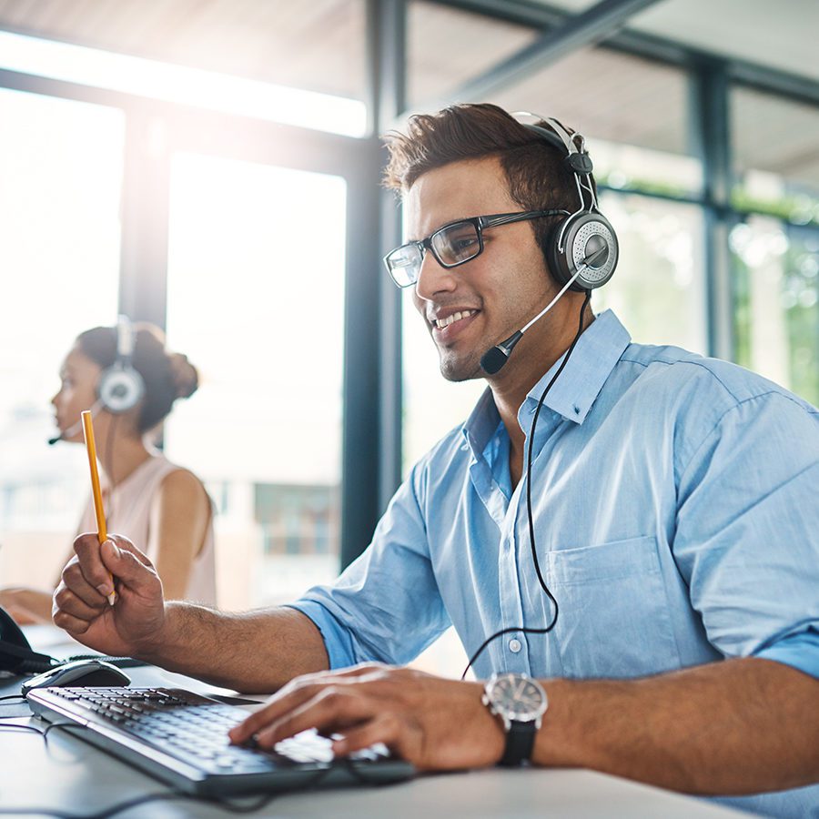 Mortgage Banker Working on Computer