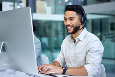 Banker Talking on a Headset The Federal Savings Bank