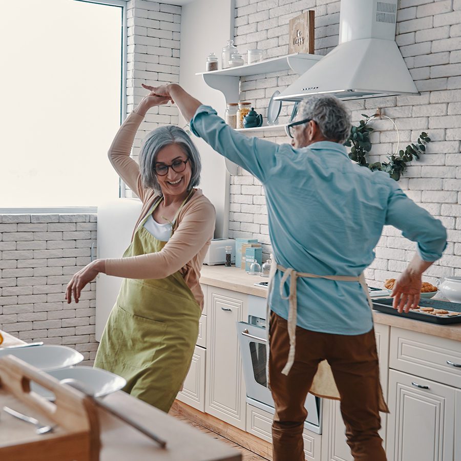 Senior Couple Dancing in the Kitchen