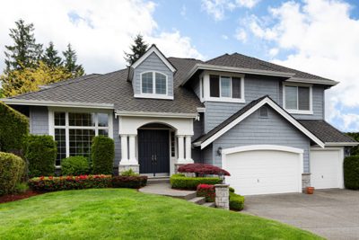 Grey House With a Black Roof