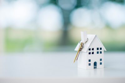 Small White Model House With Keys Looped