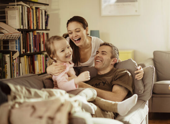 Military family of 3 smiling