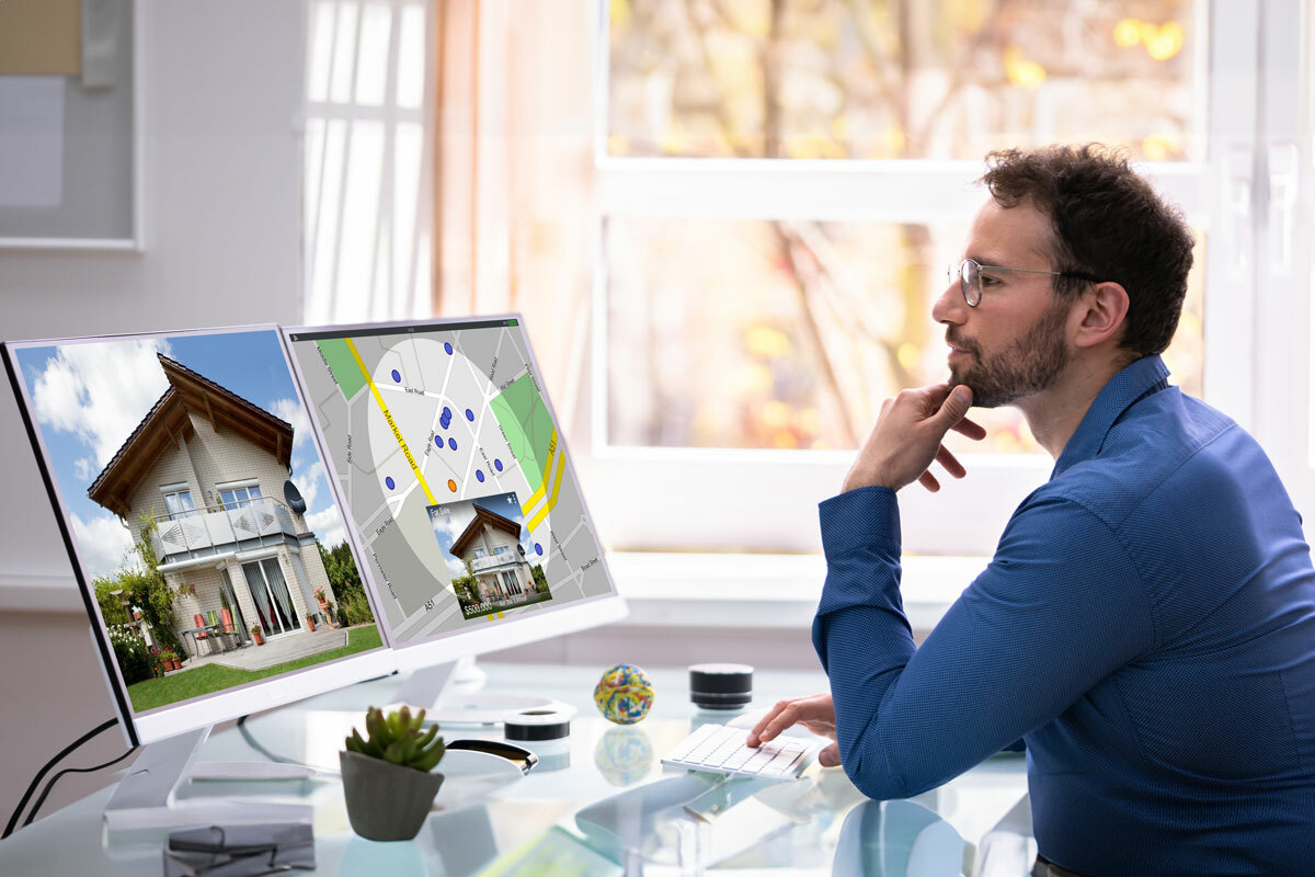 Man thinking and looking at work on computer