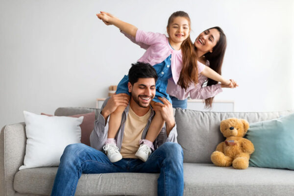 Family having fun together on the couch