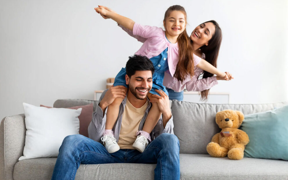 Family having fun together on the couch