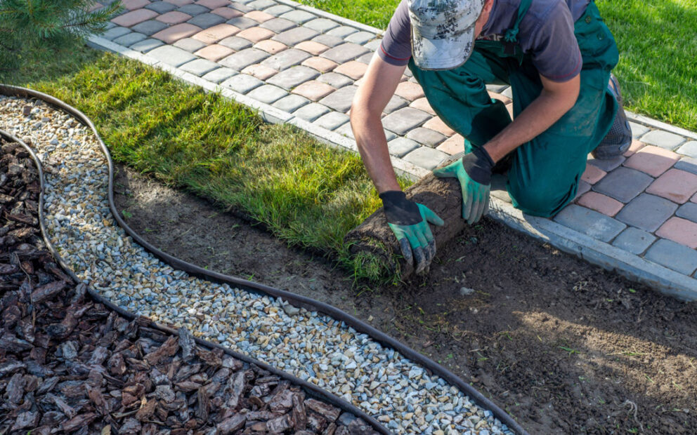 Man landscaping front yard
