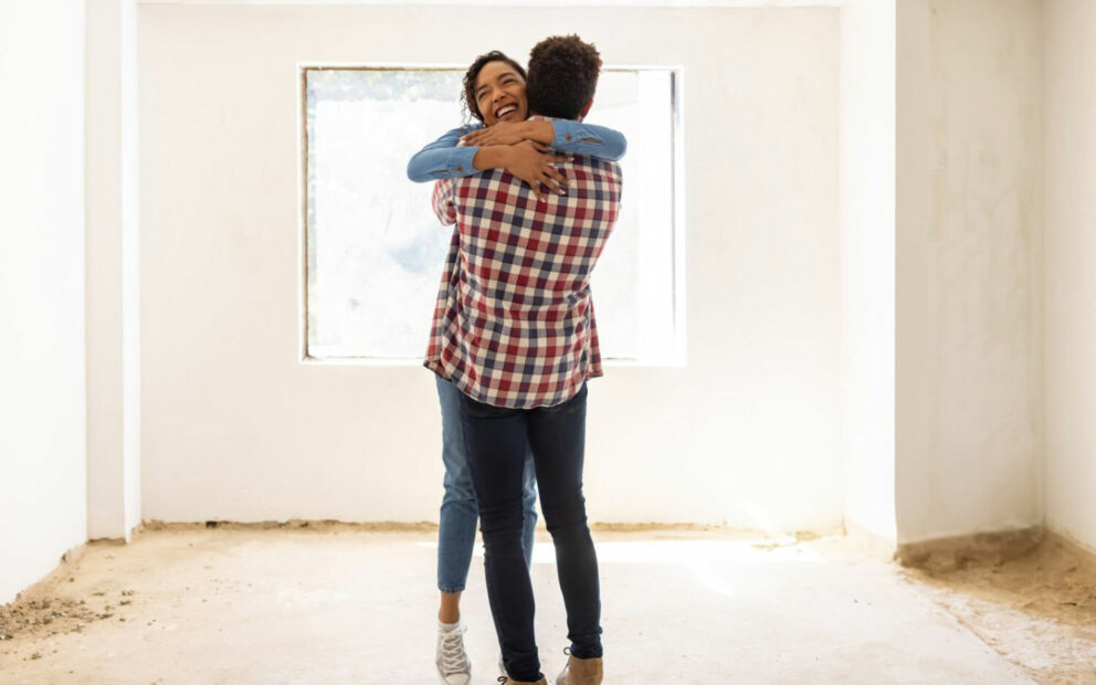 Man and woman hugging each other in ne whome