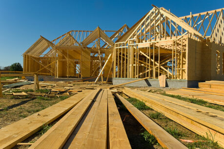 Wooden structure of house being built