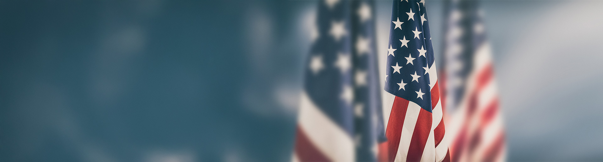American Flags on Blue Background