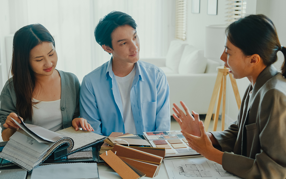 Couple speaking with advisor