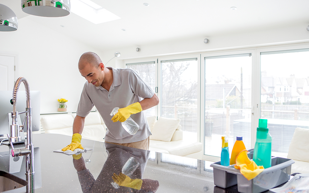 Man cleaning kitchen
