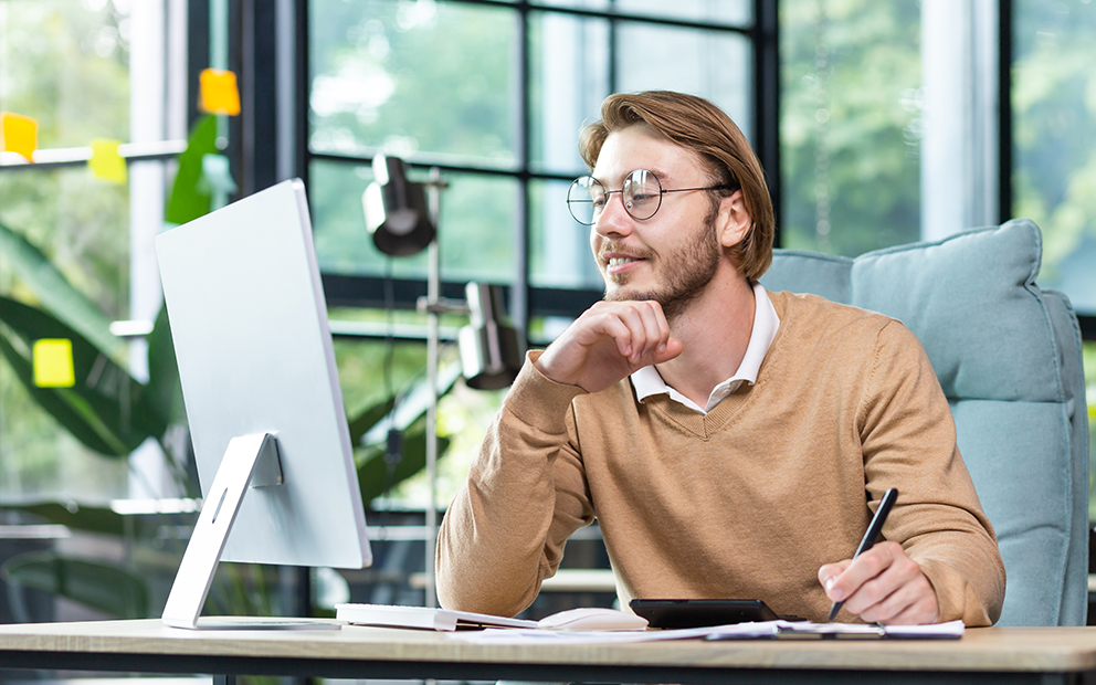 Man researching information on his computer
