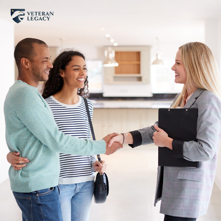 Empty house couple shaking hands