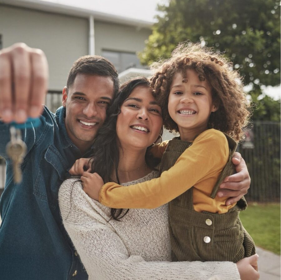 Family happy with keys