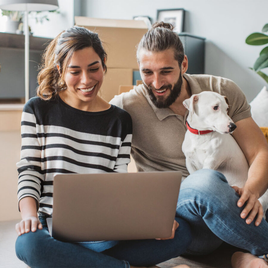 Dog on couch with family