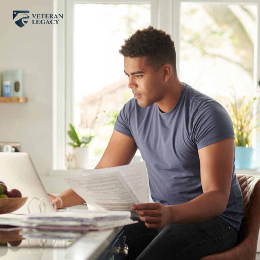 Guy filling out something complicated online