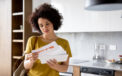 Women looking concerned while reviewing new mail