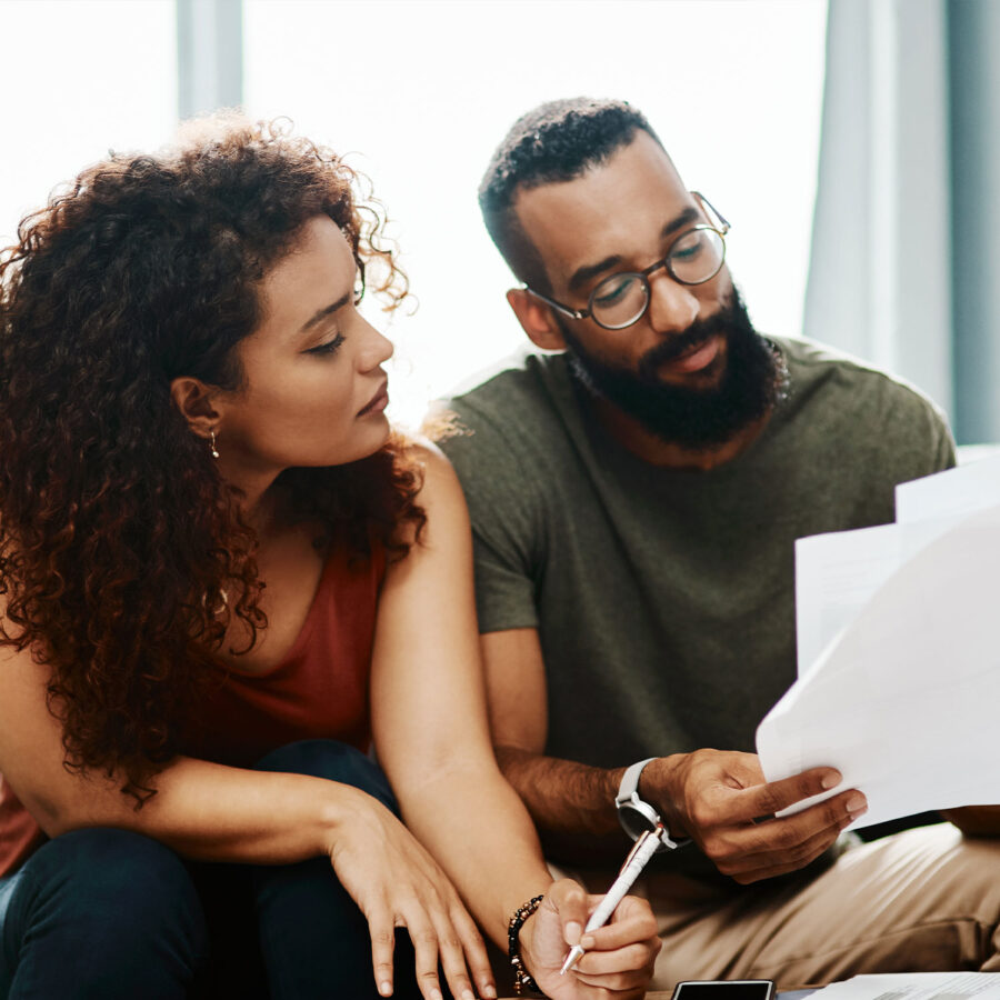 Couple reading over documents