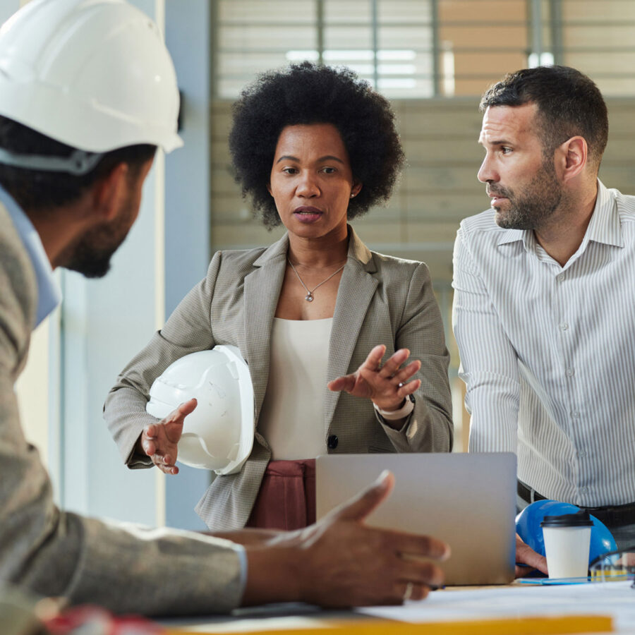 group talking with builder