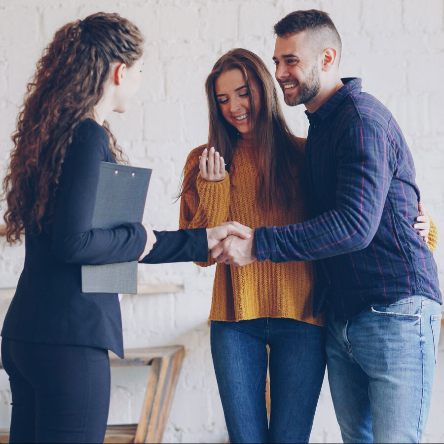 guy shaking hands with woman