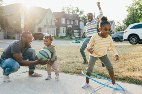 Dad enjoying outdoor activities with his kids