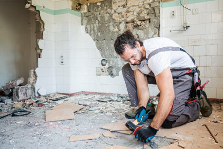Man renovating home bathroom