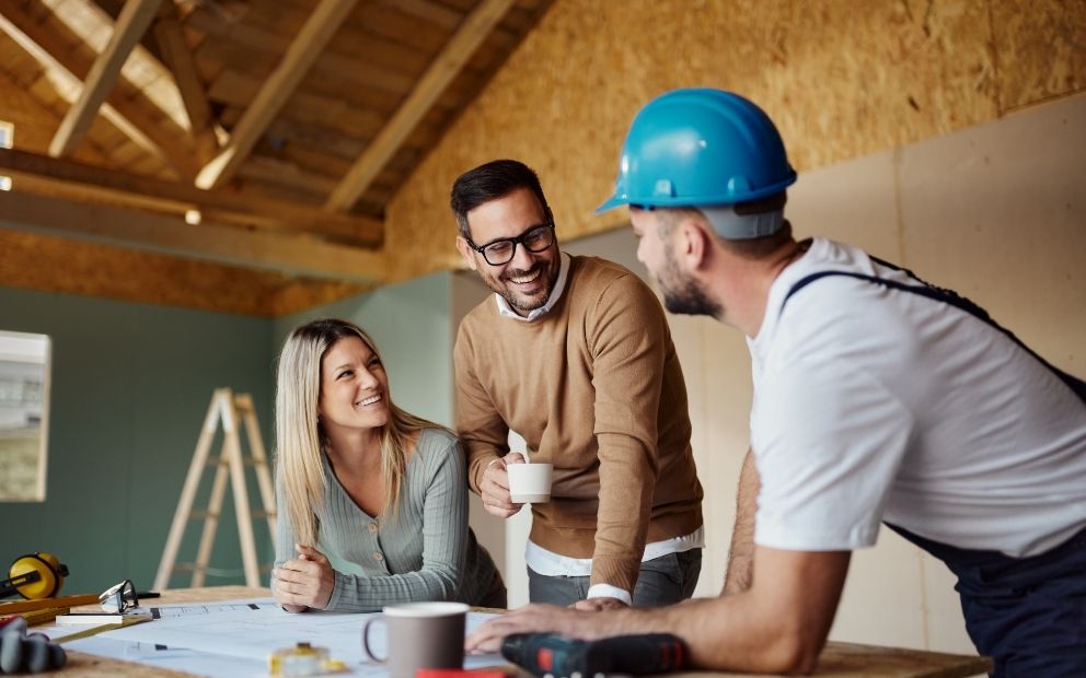 construction loan first-time homebuyer discussing build with contractor