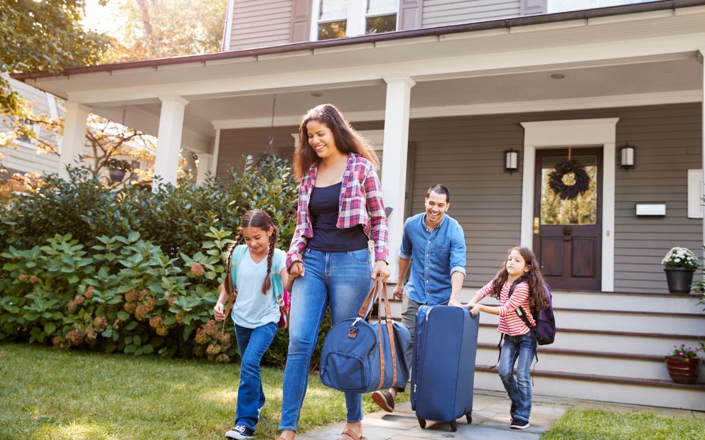 Family of four leaving for vacation, feeling glad they know how to protect your home while traveling