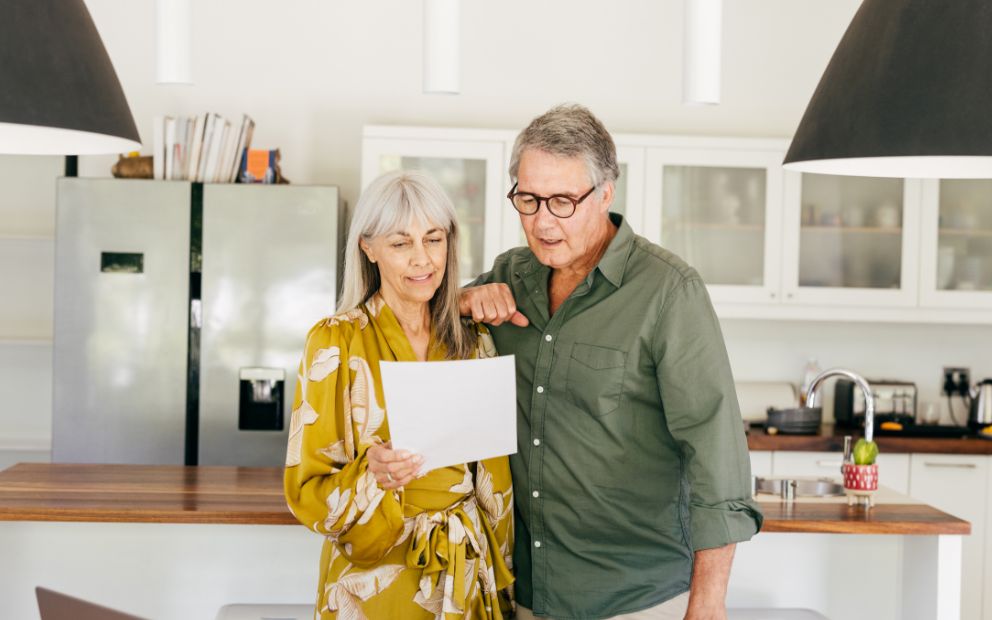 Older couple reviewing how to use home equity during retirement