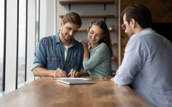 Couple happy to have learned how to make a competitive home offer