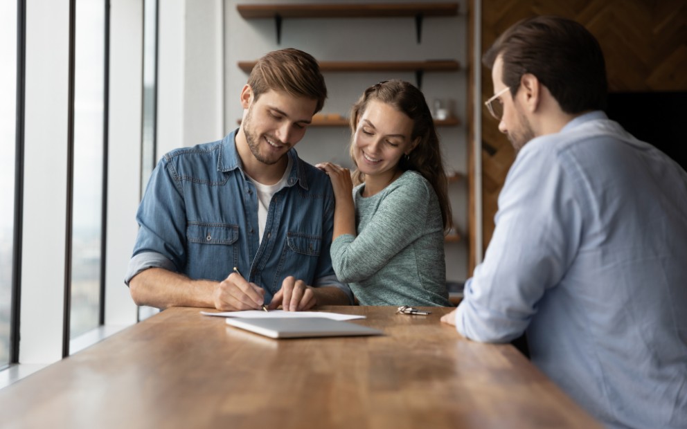 Couple happy to have learned how to make a competitive home offer