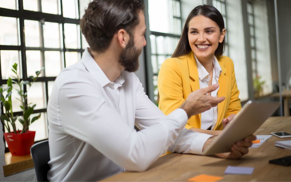 Couple discussing the differences personal loans vs credit cards