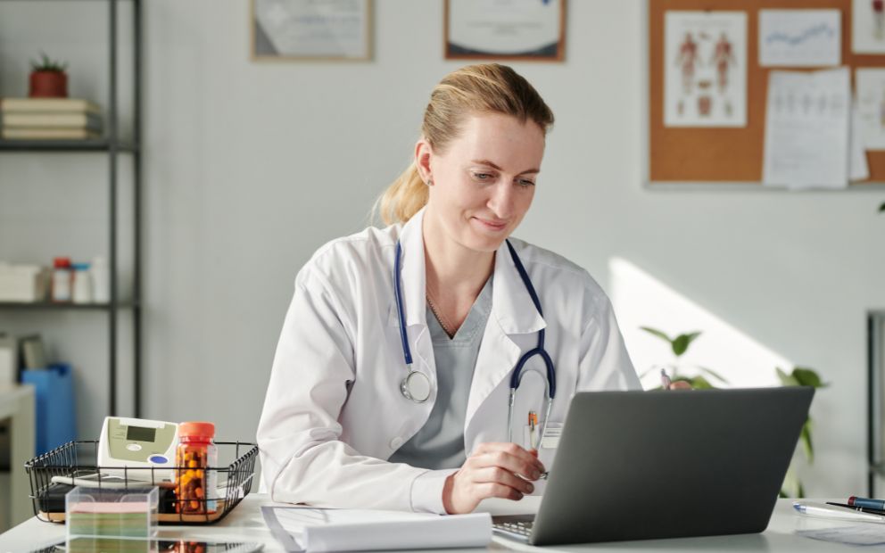 Young woman doctor researching medical professional mortgage student loans