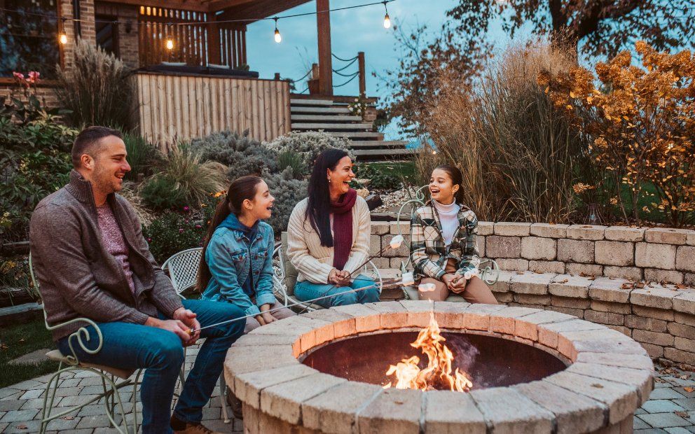 Family enjoying outdoor space after following design tips