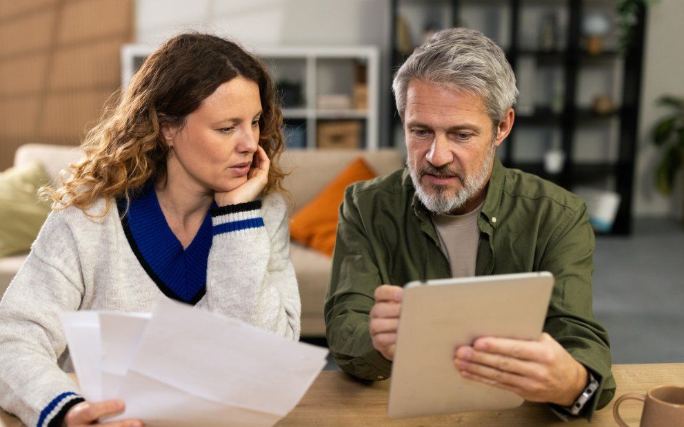 Man and woman couple discussing possibility of va cash-out after forbearance