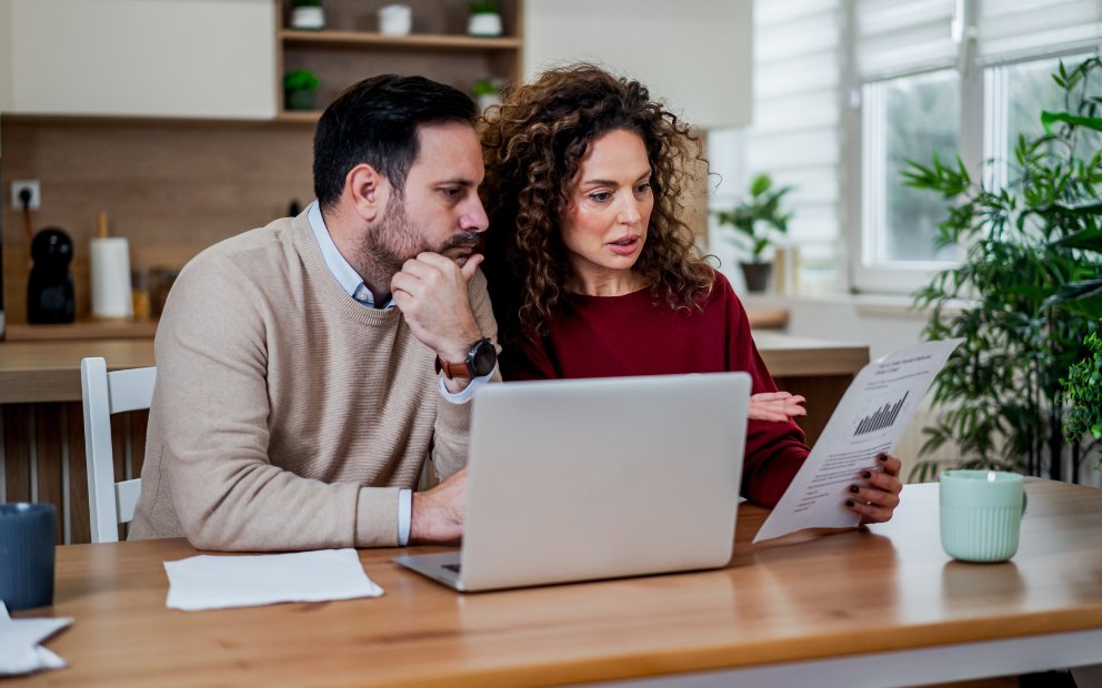Man and woman couple researching together on what is CLTV
