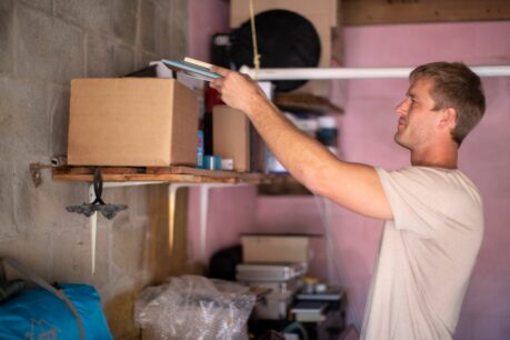 Man at home showing best tips for organizing your garage