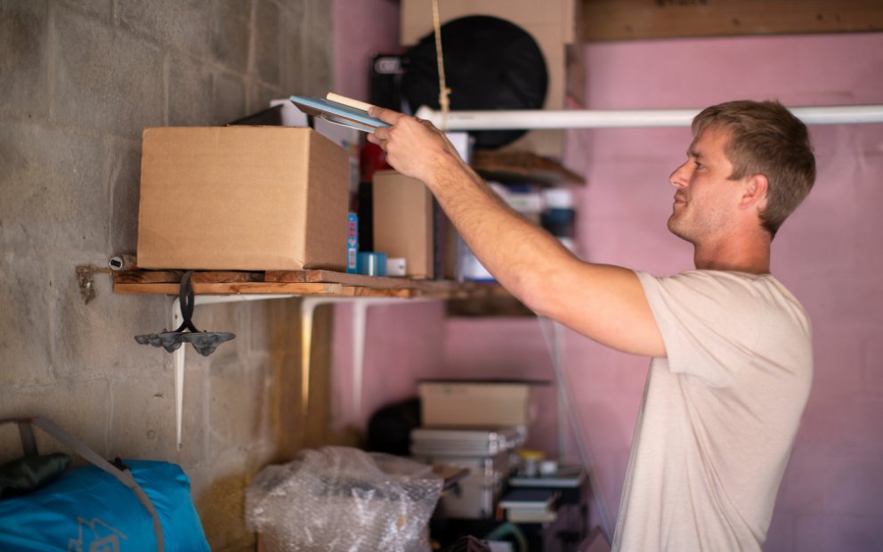 Man at home showing best tips for organizing your garage