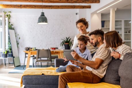 Young family of four enjoying a End of summer home reset
