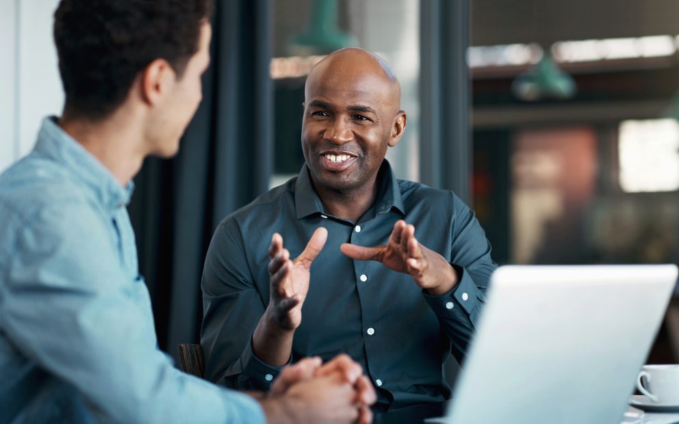 Man in office while working with an experienced VA lender