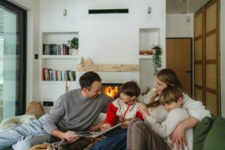 Young family of four enjoying home features for families