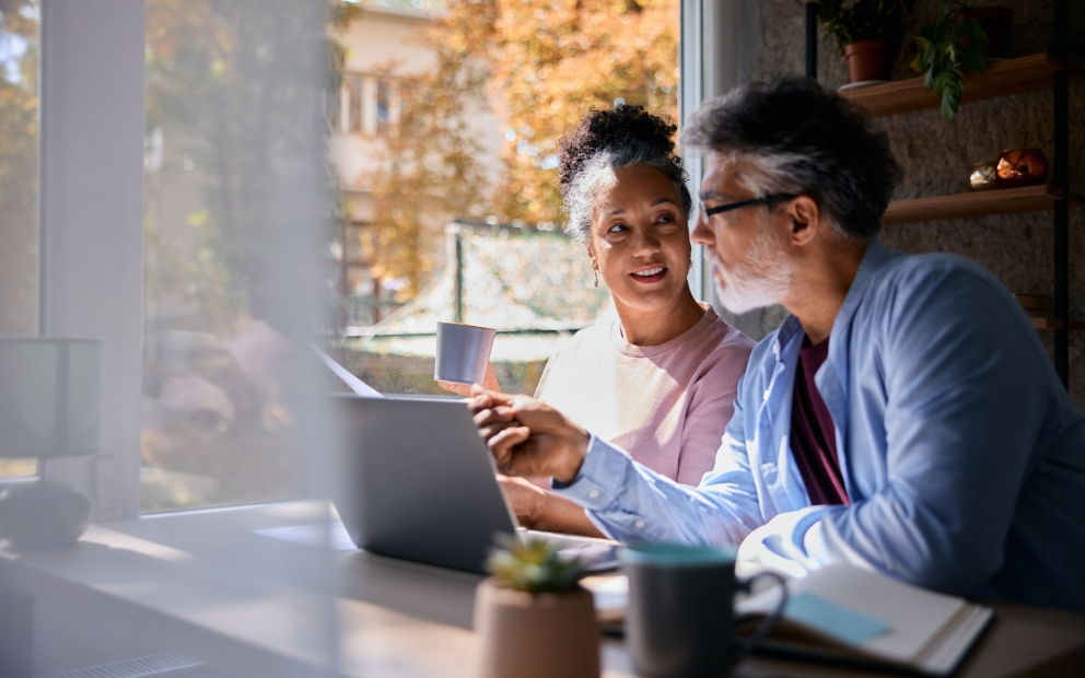 Older couple at home talking about home equity for accessibility upgrades